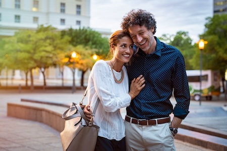 couple walking through city