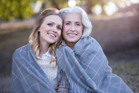 senior woman and middle aged woman