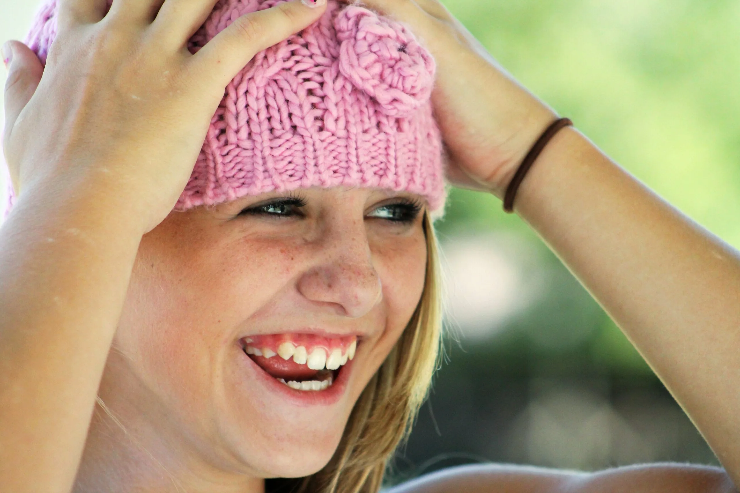 A young girl smiling after a dental checkup in Loveland.